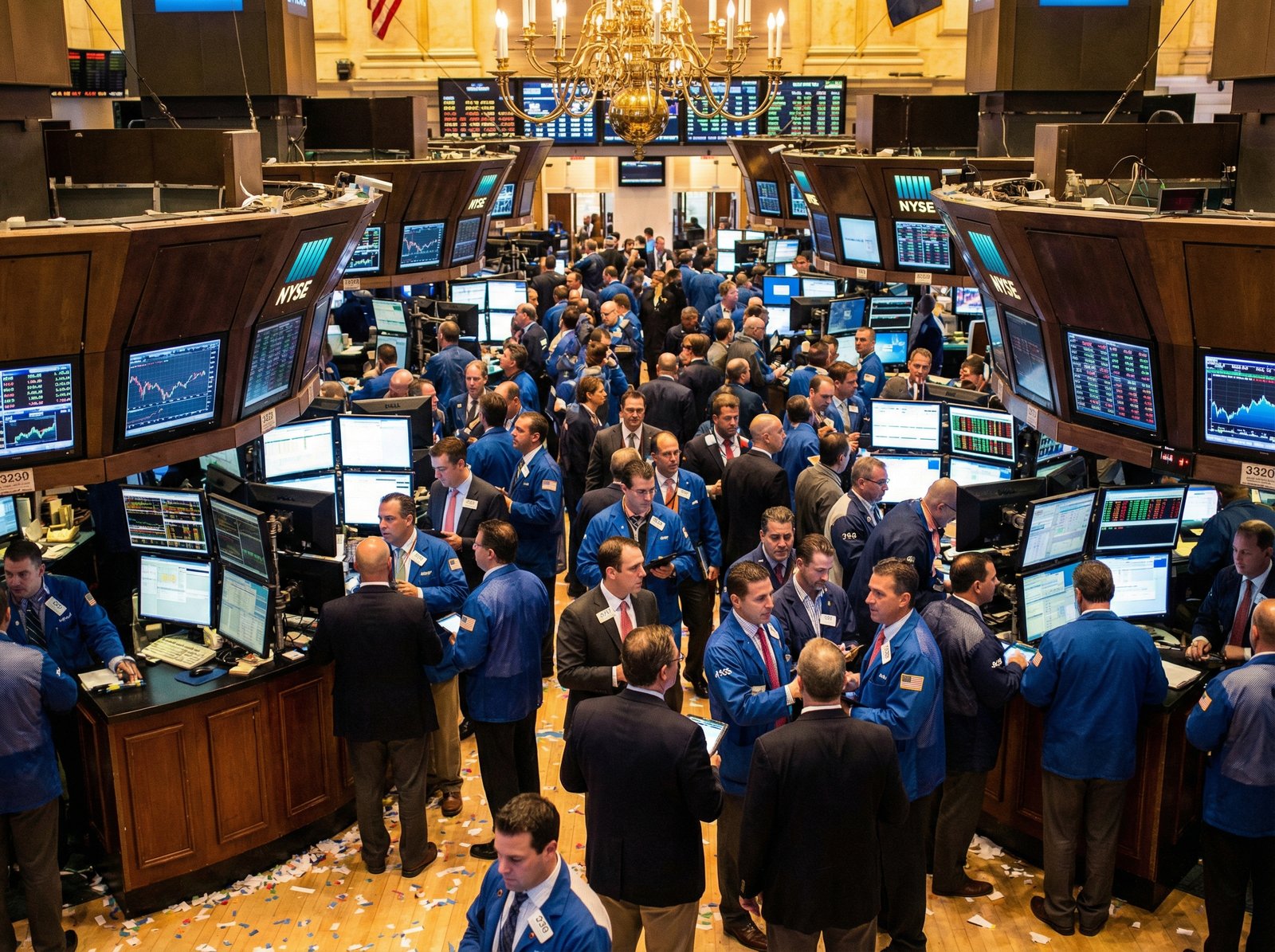 A realistic high-quality photo of the New York Stock Exchange interior during a busy trading day, professional traders looking at monitors with stock charts, warm indoor lighting, 4:3 aspect ratio, no text.