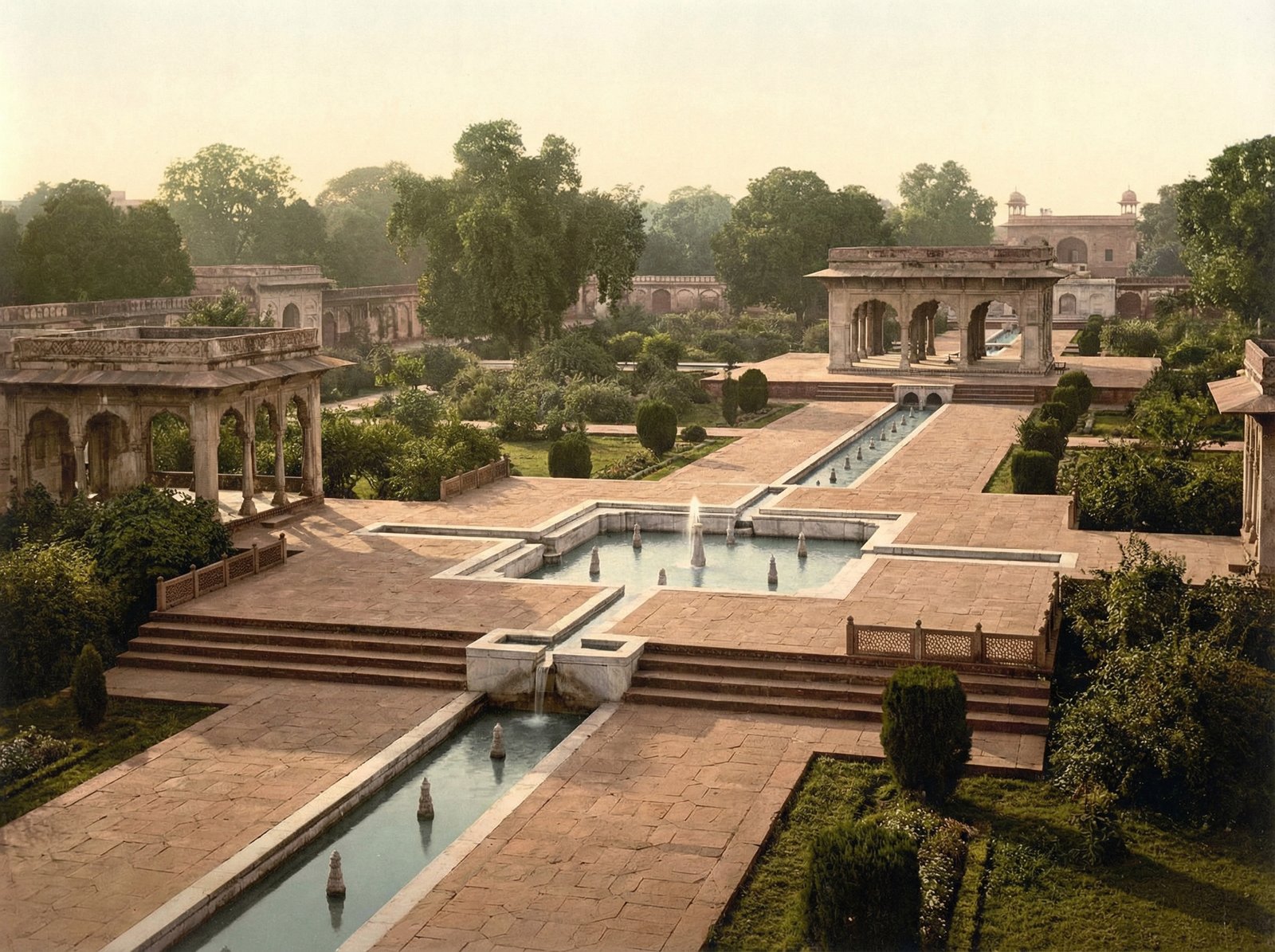 Terraced gardens and fountains of Shalamar Gardens, lush greenery and flowing water, serene and grand. History and Culture style, no visible text, aspect ratio 4:3